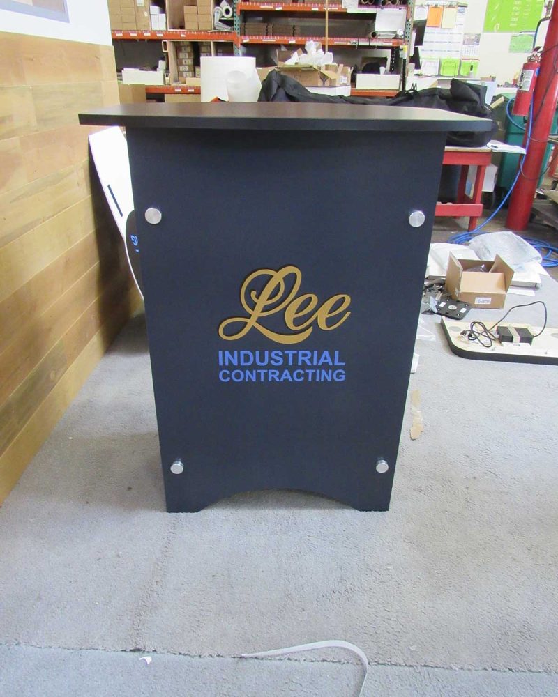 Modular laminated counter with applied vinyl graphic logo